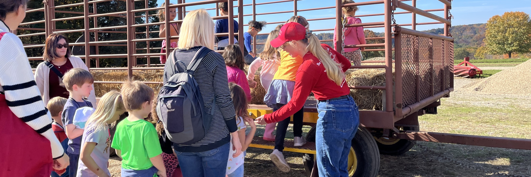 school loading on a hay wagon