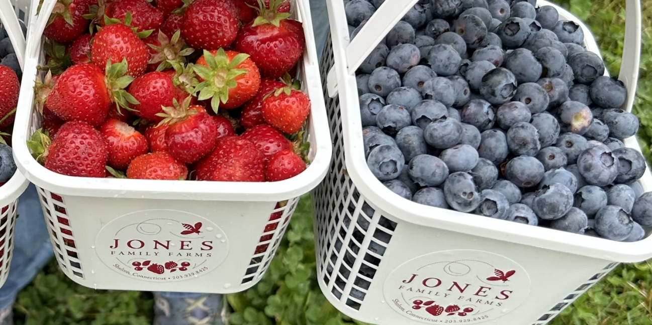 baskets of strawberries and blueberries