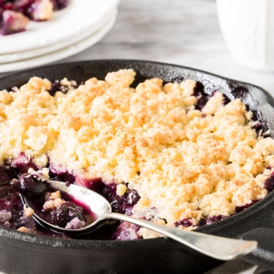 Blueberry Apple Crisp served in a cast iron pan