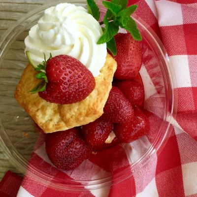 plated Strawberry Shortcake on a red and white checked cloth napkin